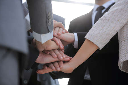 closeup. business team with hands clasped together