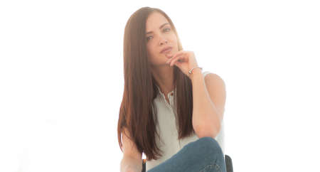 young successful woman sitting in a chair
