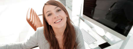 modern business woman sitting at her Desk.の写真素材