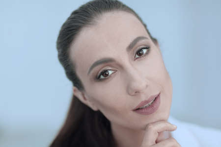 closeup portrait of a dreaming business womanの写真素材