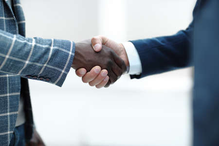 close up.handshake of international business peopleの写真素材