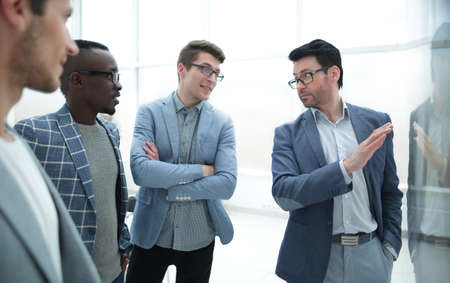 project Manager and the business team are discussing work problemsの写真素材