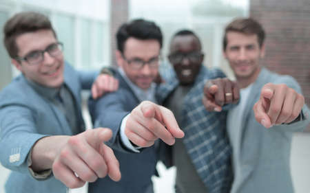 international business team pointing fingers at youの写真素材