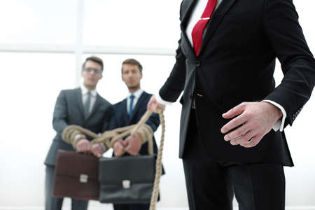 boss and rope-bound employees