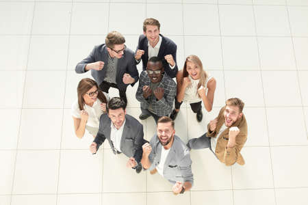 top view.happy business team . the concept of success