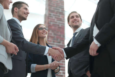 Group of people chatting in the officeの写真素材