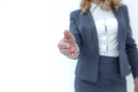 closeup. business woman stretching hand for handshake