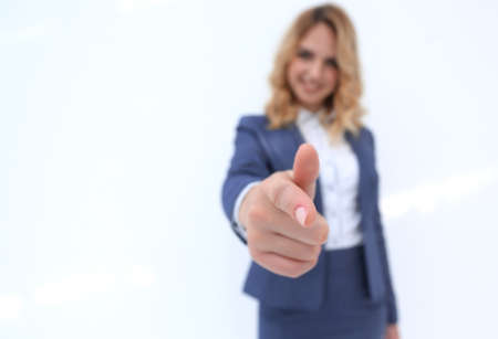 Young Woman pointing finger to Youの写真素材