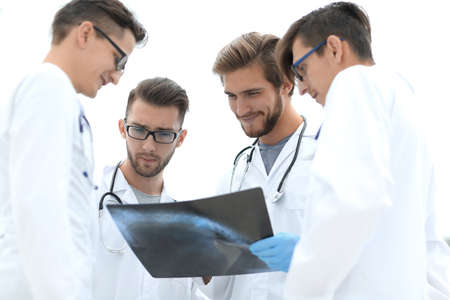 group of radiologists discussing x-rayの写真素材