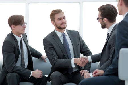 handshake business people in the office.の写真素材