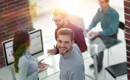 Business people discuss something at the meeting at the modern o