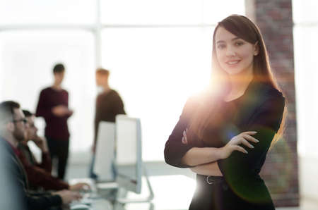 business woman on blurred background officeの写真素材