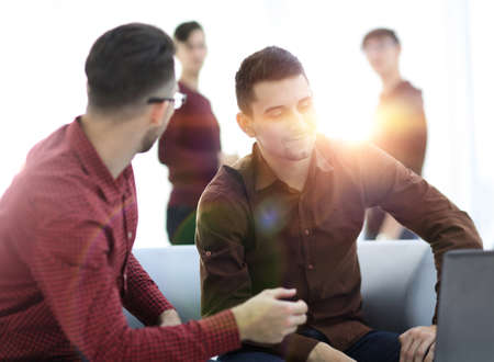 Two men working on laptop in the office.の写真素材