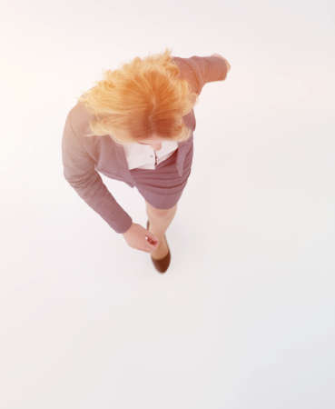 view from the top. business woman stepping forward .の写真素材