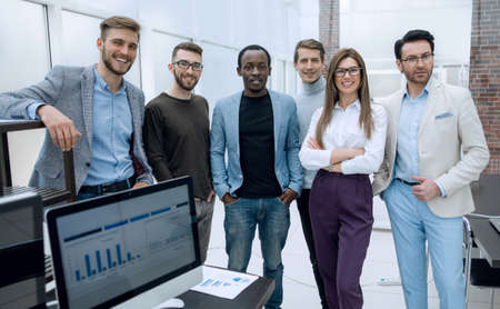 business team standing in a modern office