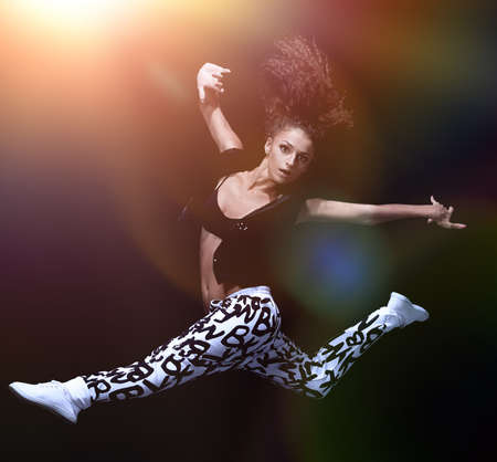Girl jumping in hip hop styleの写真素材