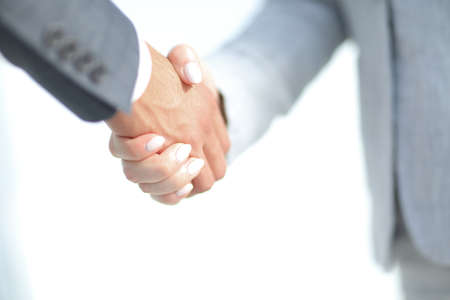 Businessmen handshaking after successful business meetingの写真素材