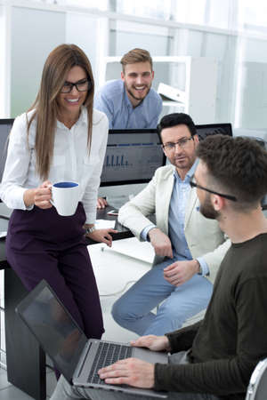 business woman and business team talking during work break