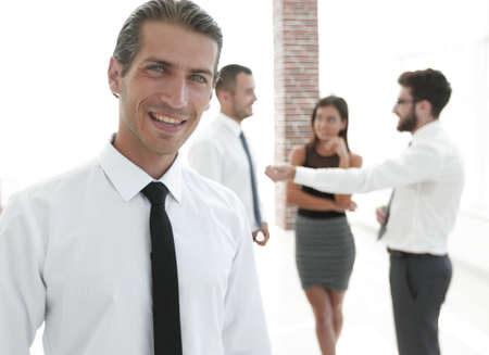 portrait of a successful business person on the background of colleagues.の写真素材