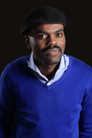 Black business man overturned hat, black background