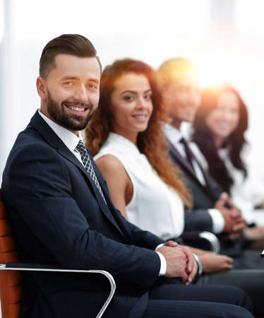 group of business people sitting at the desktopの写真素材