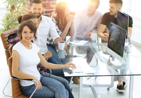 group of young employees discussing ideas