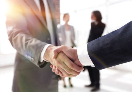 closeup.reliable handshake of business partners
