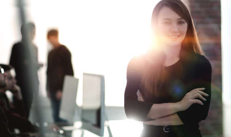 business woman on blurred background officeの写真素材