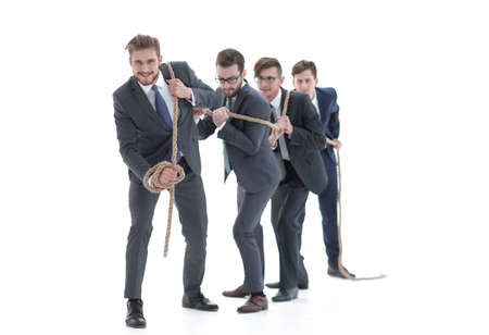 closeup.smiling business team pulls the rope.の写真素材