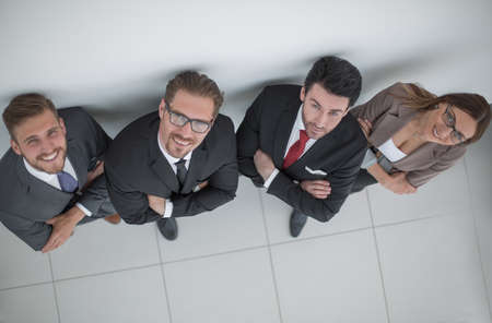 top view.smiling business team looking at the camera