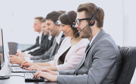 colleagues call centre workplace in the officeの写真素材