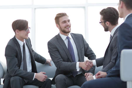 handshake business people in the office.の写真素材