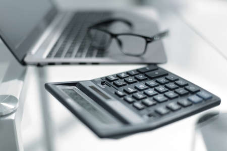 Working place with keyboard, calculator