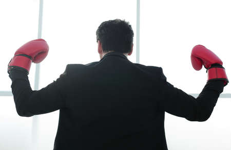 rear view.entrepreneur in red Boxing gloves