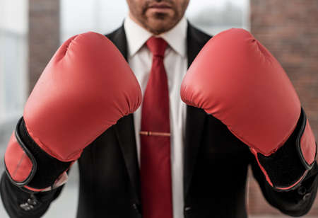 close up.businessman in Boxing gloves