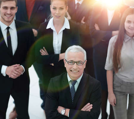 view from the top. group of smiling business people looking at camera.の写真素材