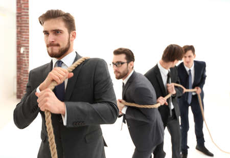 business team pulls the ropeの写真素材
