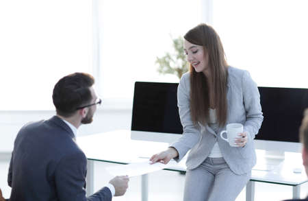 employee gives the Manager the document.の写真素材