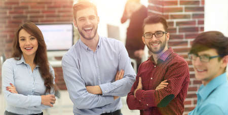 Happy smiling business team in office.の写真素材