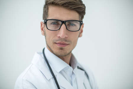 portrait of doctor-diagnostician on a light backgroundの写真素材