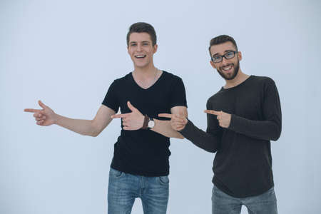 beautiful men showing direction for copy space