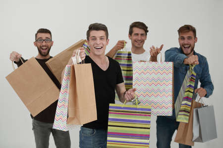 young people celebrate with packages in hands