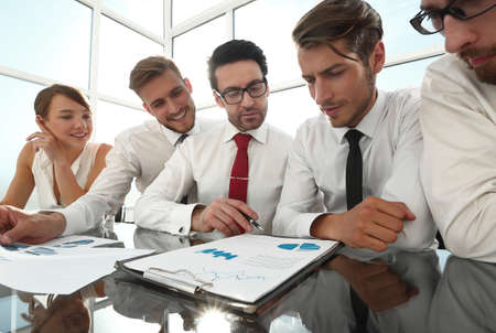 business team analyzing financial documentsの写真素材