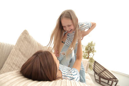 mom plays with her daughterの写真素材