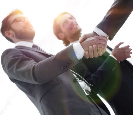 Cropped image of business people shaking handsの写真素材