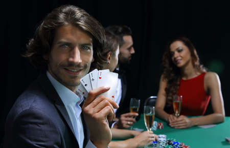 group of sinister poker players