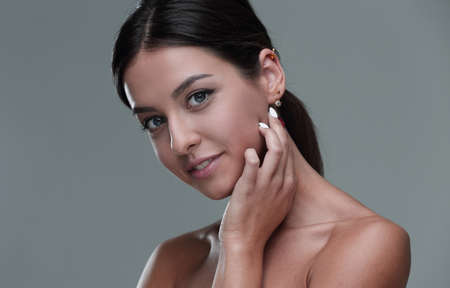 Close-up portrait of a beautiful woman with natural make-up
