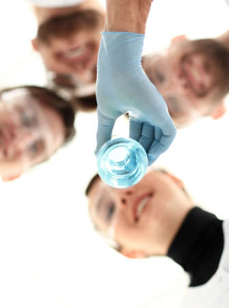 healthcare professionals working with liquids in laborator