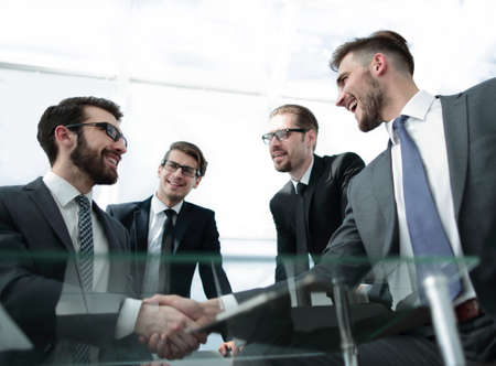 bottom view.a handshake is serious business partners