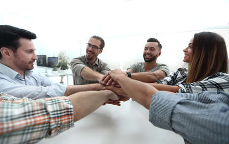 close up.business team folded their palms together, over the Deskの写真素材